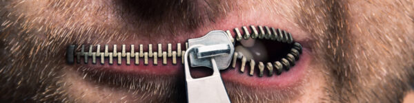 Zipper mouth to silence man
